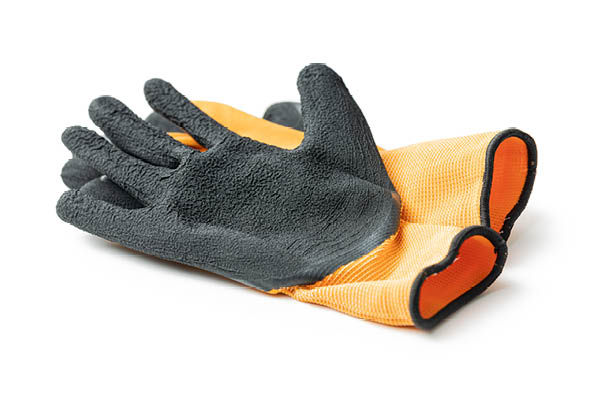 Textile work gloves with rubber isolated on white background.